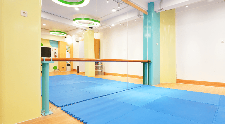 a blue mat in a gym